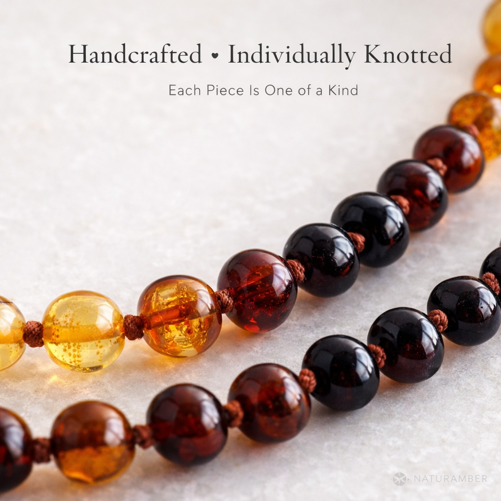 Handcrafted amber necklace with text on a light background
