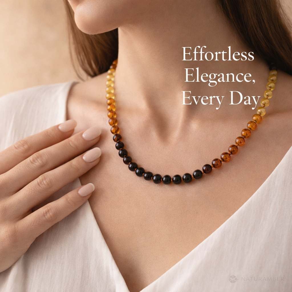 Necklace with multicolored beads worn by a person, with text 'Effortless Elegance, Every Day' on a neutral background.