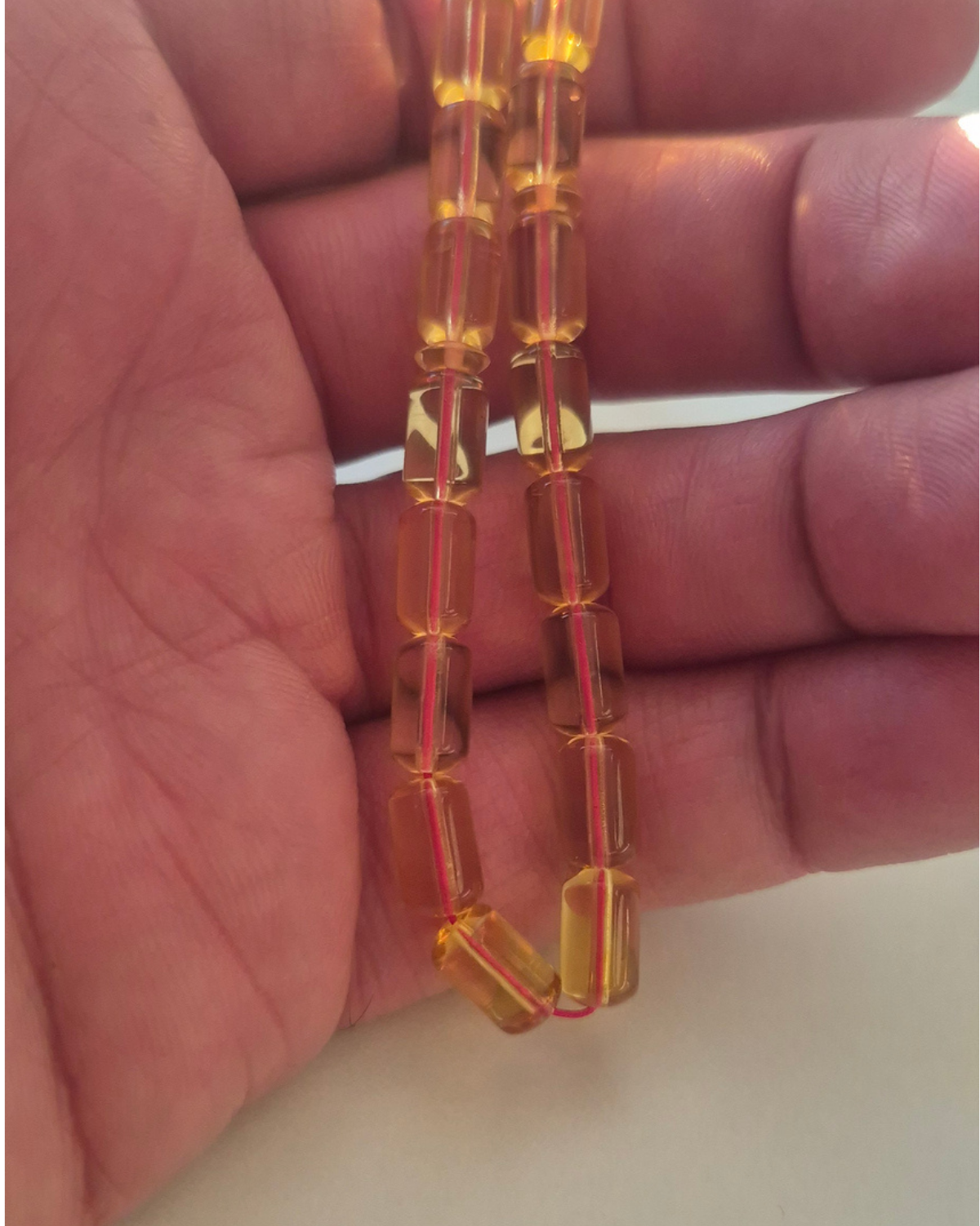 Bal Kehribar Tesbih — 10×5.7 mm fıçı kesim, 33 tane · Doğal Baltık damla kehribarı — ek görünüm