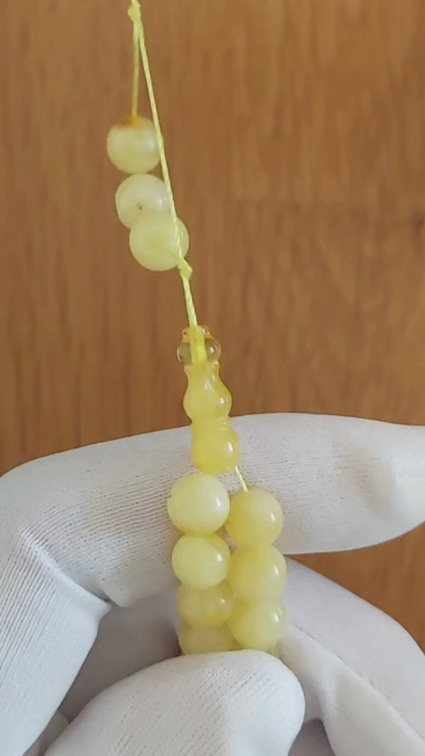 Damarlı Sütlü Damla Kehribar Tesbih — 7 mm Küre Kesim · 33 Tane - Baltık kehribarı