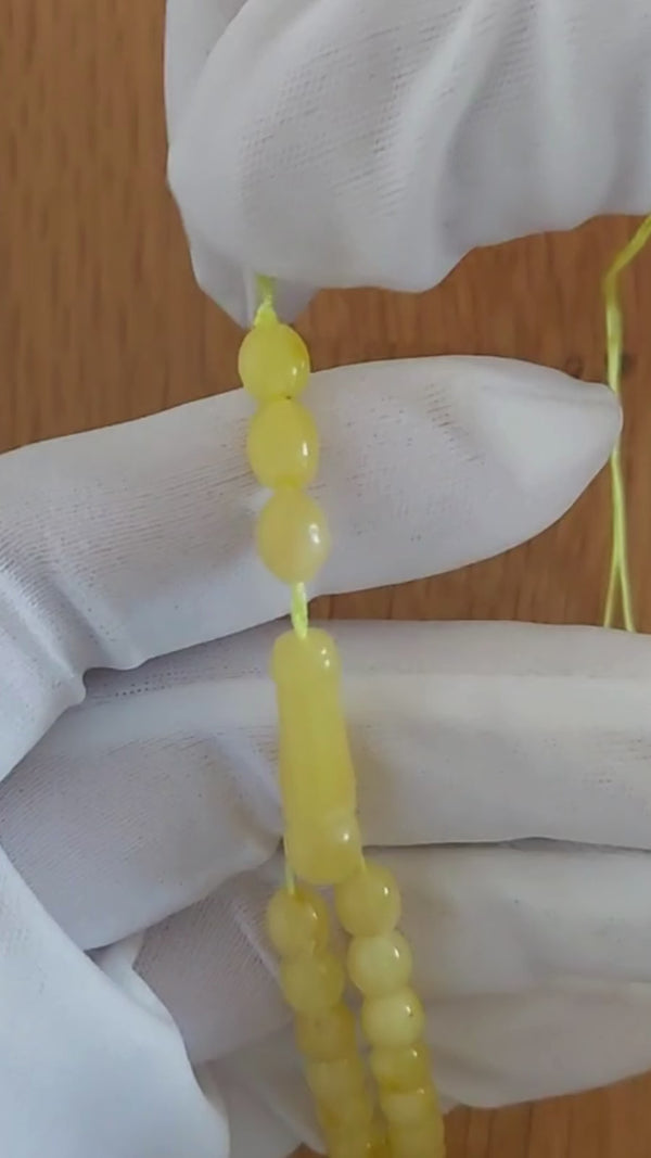 Beyaz Sütlü Kaya Damla Kehribar Tesbih — 7,5×6 mm Zeytin Kesim · 33 Tane - Baltık kehribarı