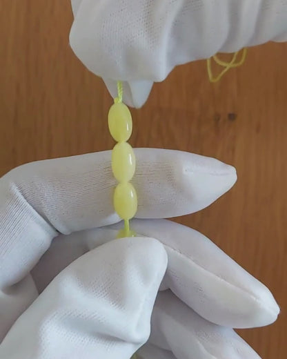 Beyaz Sütlü Kaya Damla Kehribar Tesbih — 10×6 mm Zeytin Kesim · 33 Tane - Baltık kehribarı