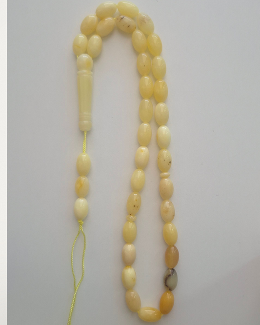 Sütlü Kehribar Tesbih — 9.5×6.5 mm zeytin kesim, 33 tane · Doğal Baltık damla kehribarı